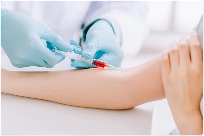 Image of a person getting a blood draw.