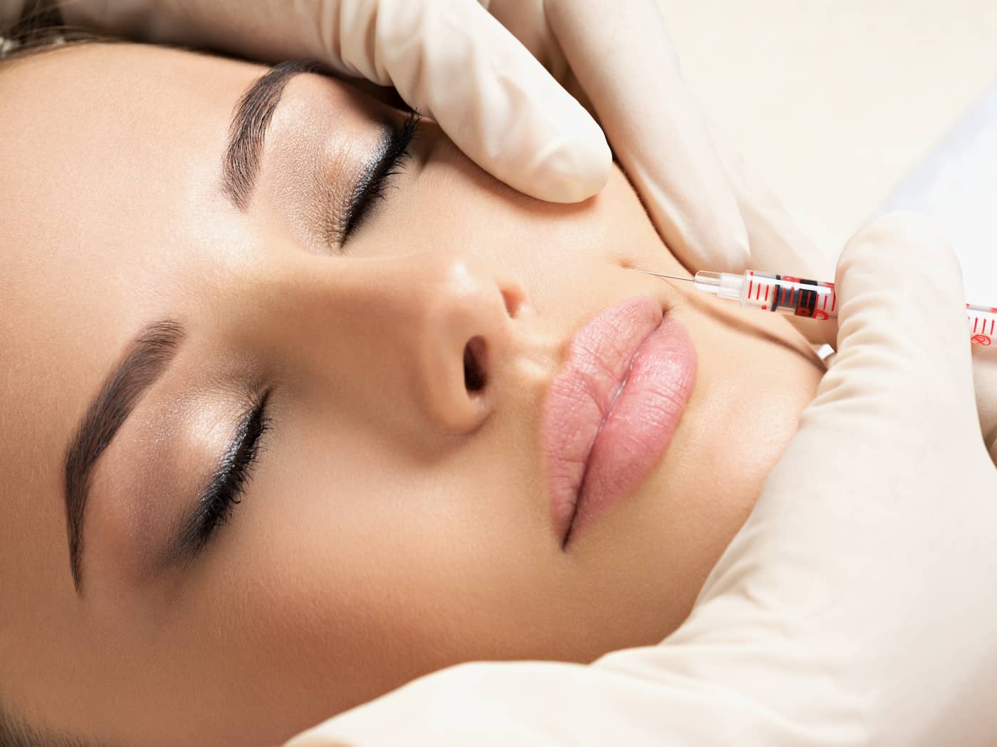 Image of a woman getting an injection at a med spa.